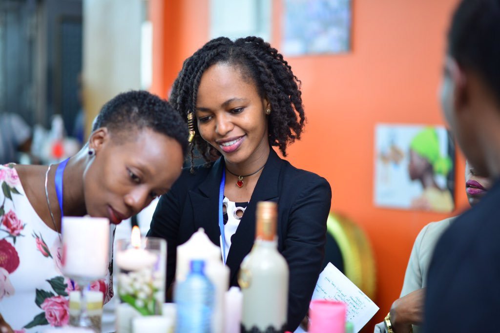 Buyers at an exhibition table